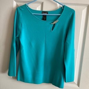 Aqua/teal color sweater. Size M